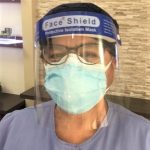 Behind the PPE Sandra's smile and sweet nature still comes across.