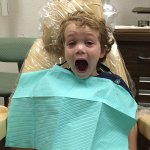 A happy children dentistry patient of Gilroy Smiles in the dentist chair