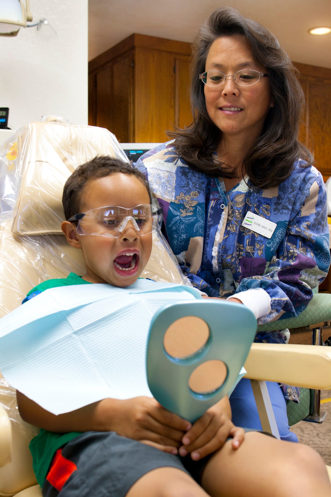 Gilroy Smiles young patient checking out his healthy teeth