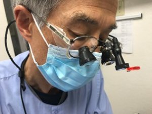 Dr. Chan using LumaDent